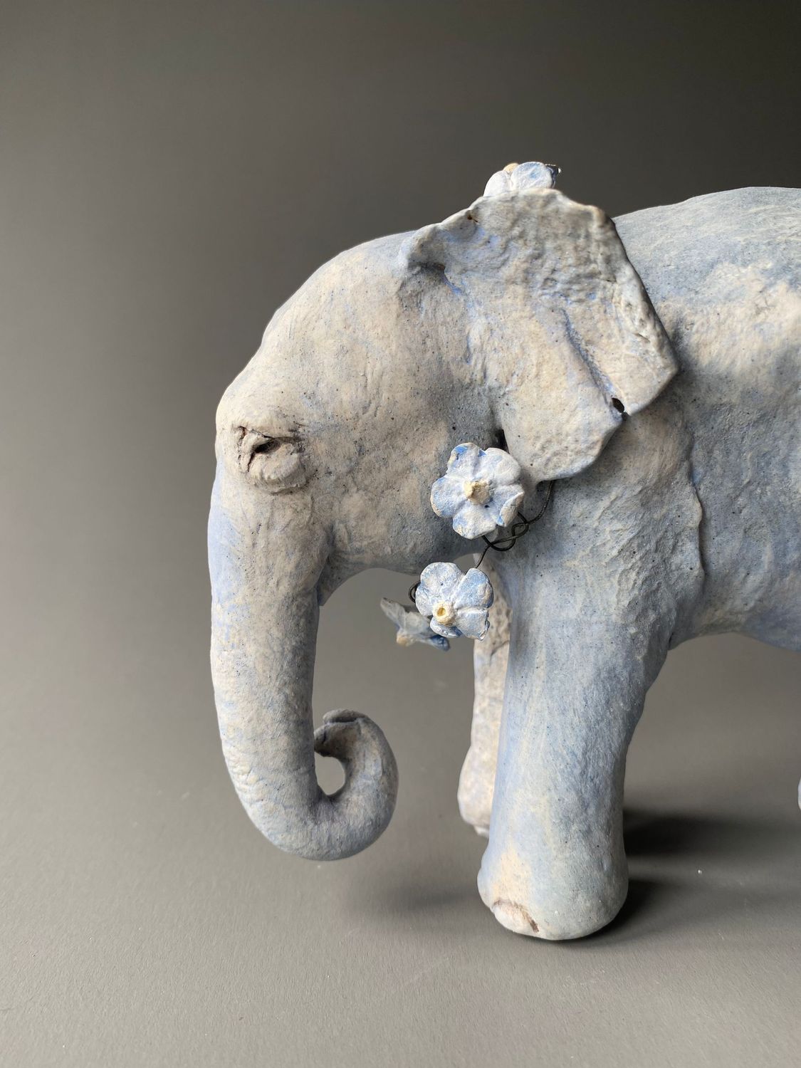 blue elephant with forget-me-nots
