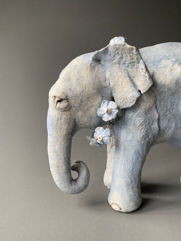 blue elephant with forget-me-nots