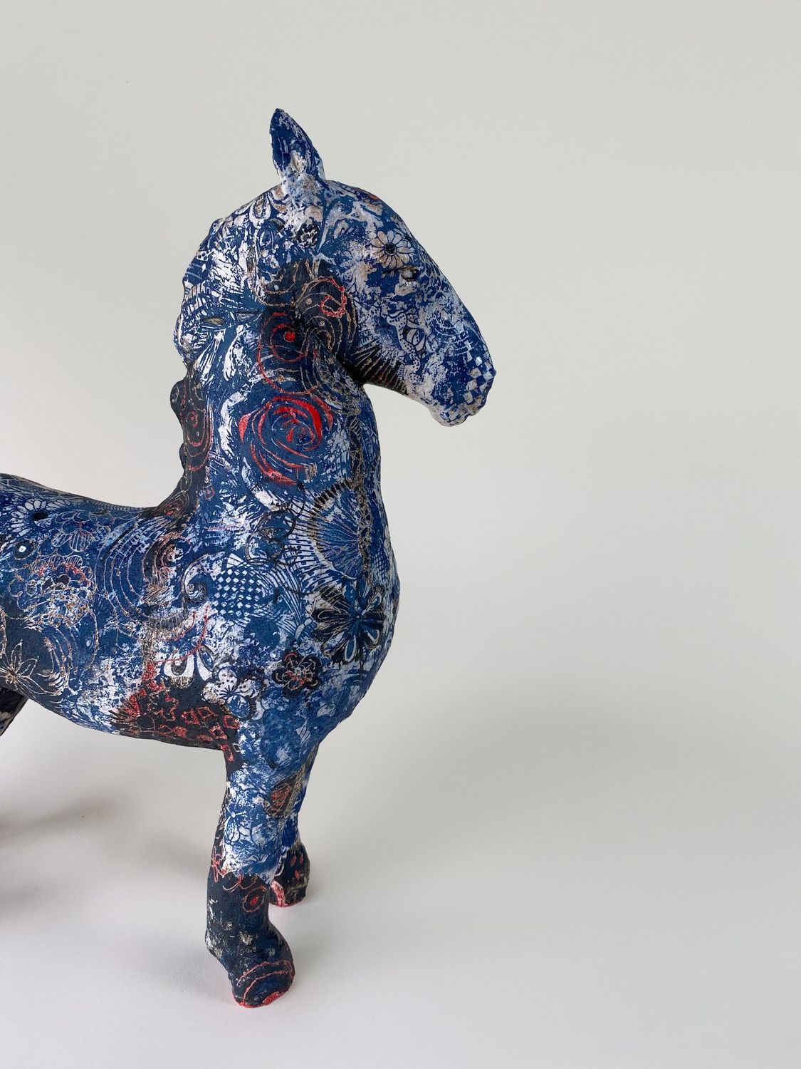 Horse with red hooves