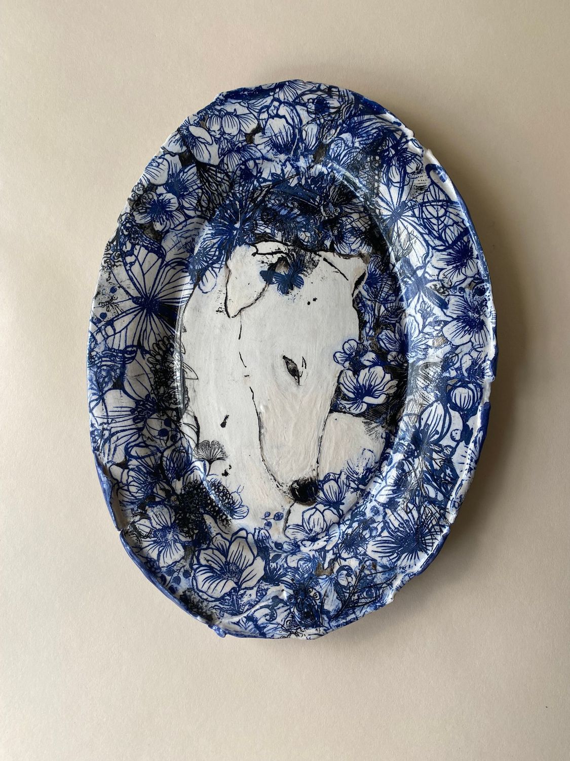 hound head botanical oval plate.