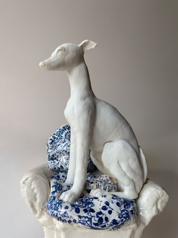porcelain hound on chair