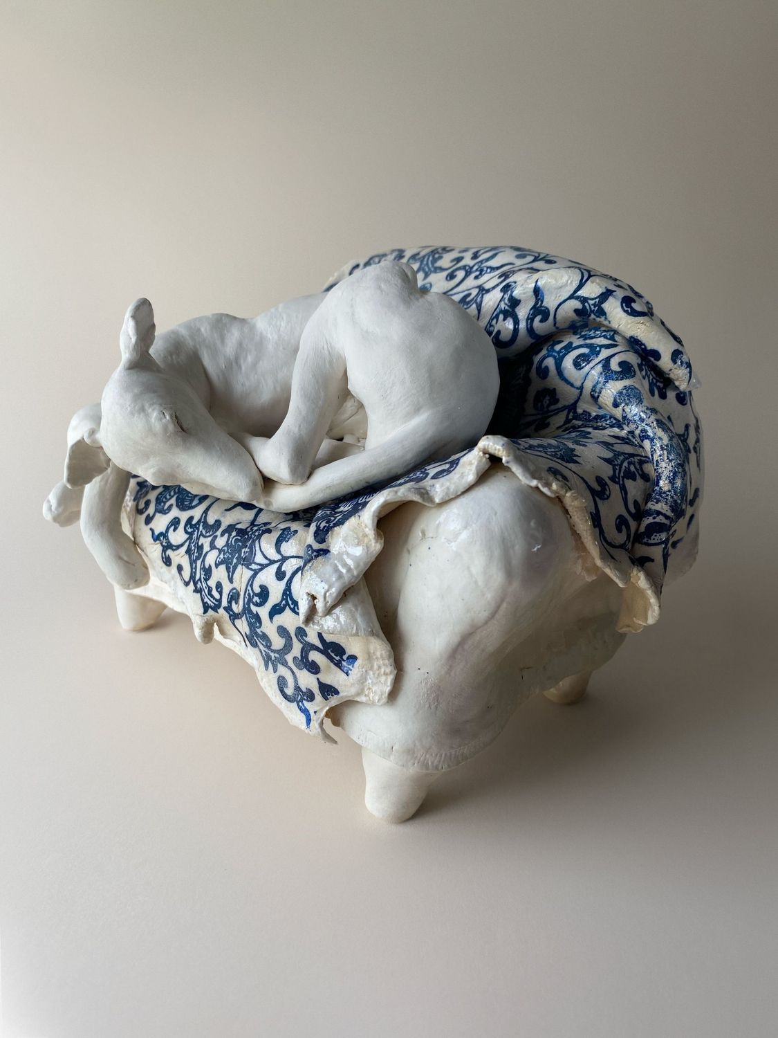 sleeping hound in blue and white sleeping hound in blue and white