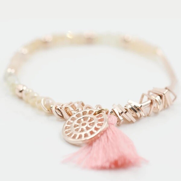 DELICATE BEADED BRACELET WITH CHARM AND TASSEL DETAIL