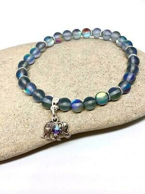 Matte Grey/Purple Faux Quartz 7 inch stretch stacker bracelet, with Elephant charm and tanzanite presiosa bicone bead.