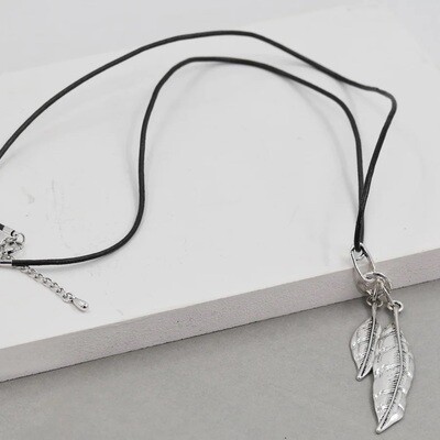 FEATHER PENDANT ON LONG BLACK LEATHER NECKLACE