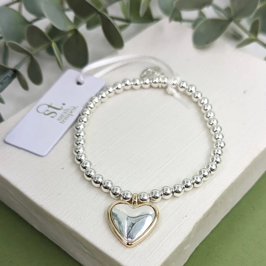 HEART CHARM ON STRETCHY BEADED BRACELET