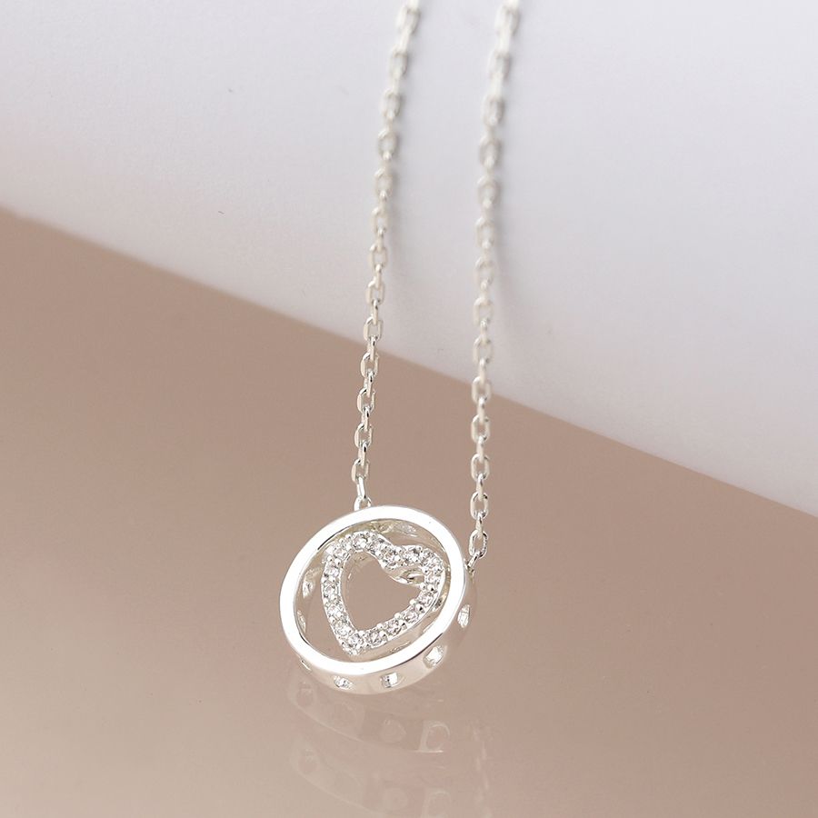 Pom Silver plated crystal heart in circle necklace
