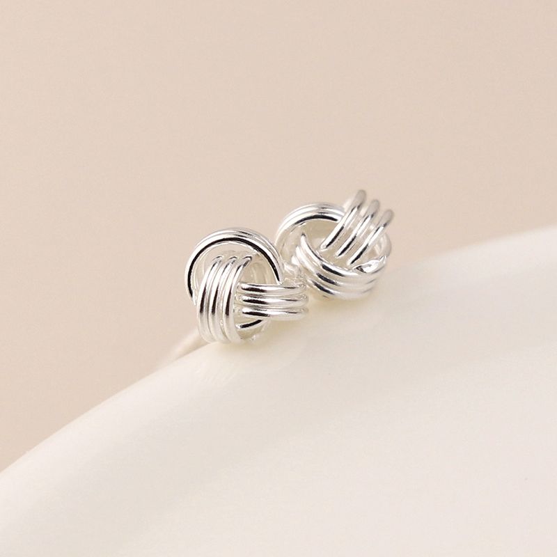 Pom Sterling silver knotted yarn earrings