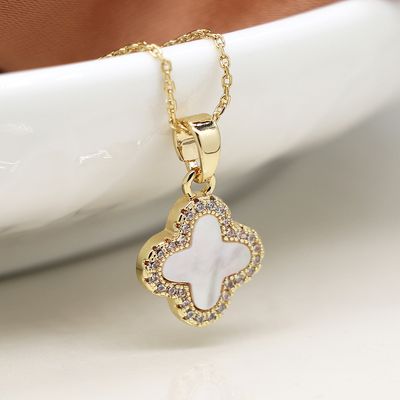 Pom Golden crystal edged quatrefoil necklace