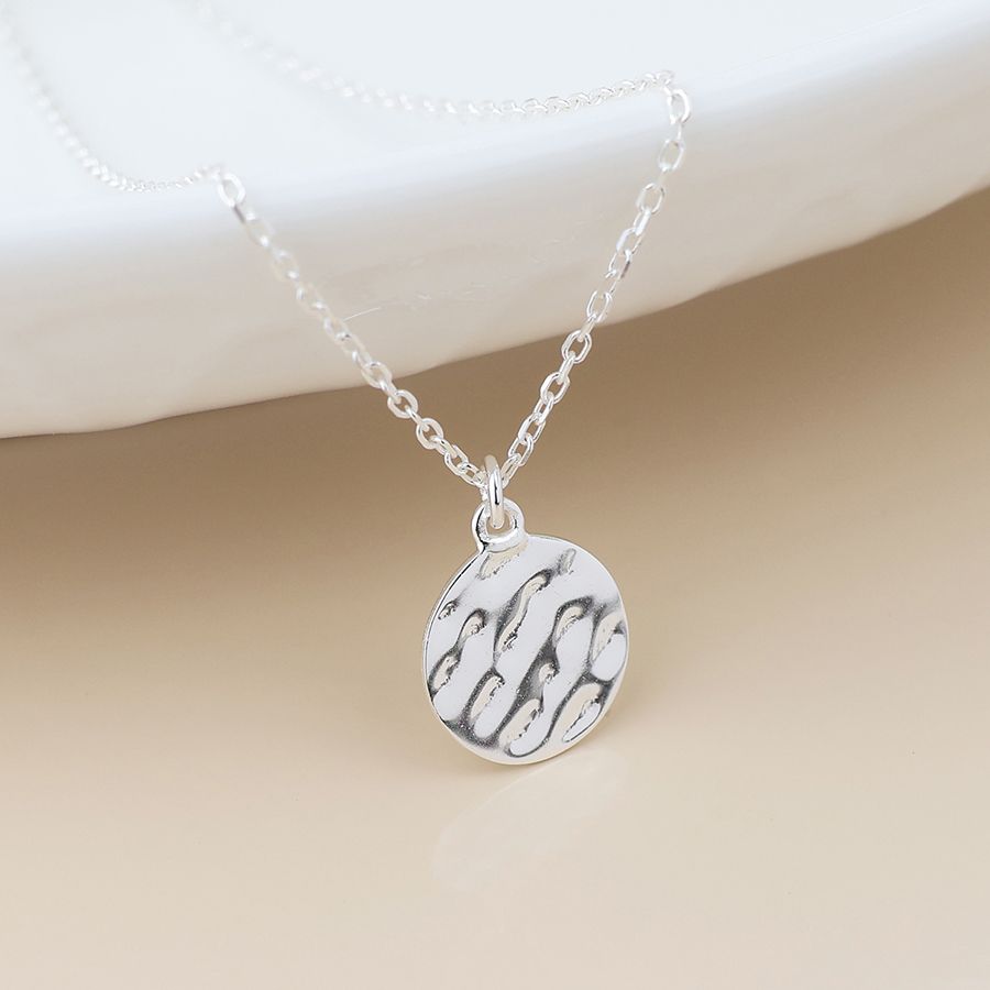 Sterling silver single hammered disc necklace