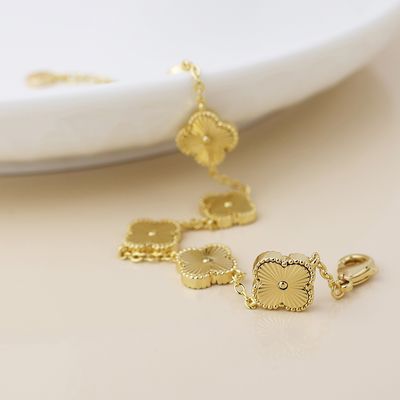 Faux Gold Plated Quatrefoil Station Bracelet