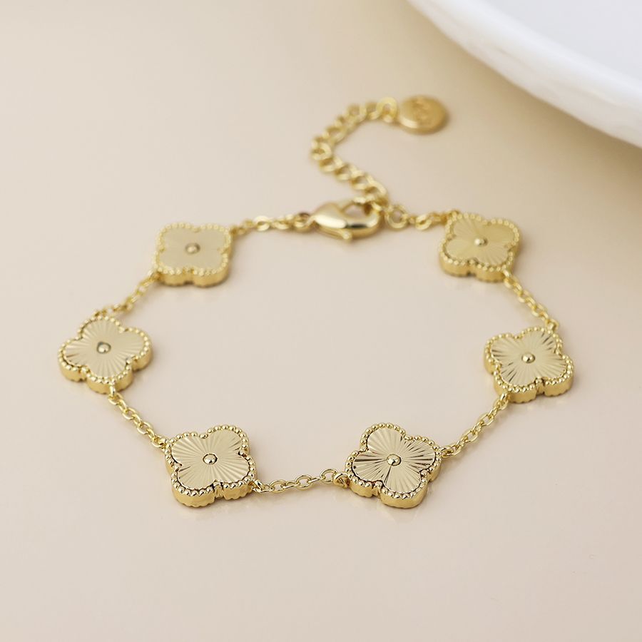 Faux Gold Plated Quatrefoil Station Bracelet