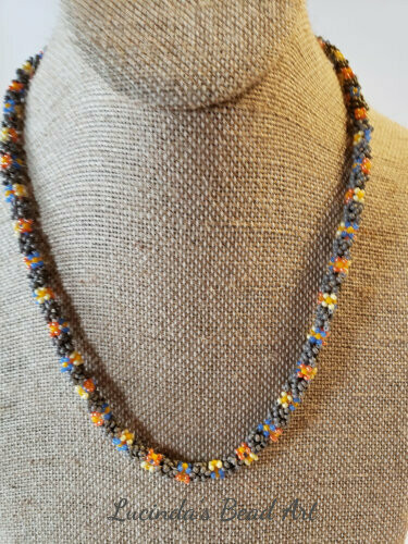 Tubular Seed Bead Flower Necklace in Yellows, Blue, Orange and Gray