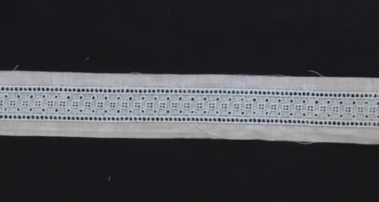 146B White/Blue Swiss insertion.  Priced Per Yard)