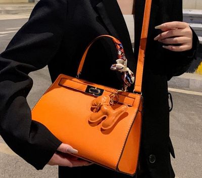 Orange top-handle bag