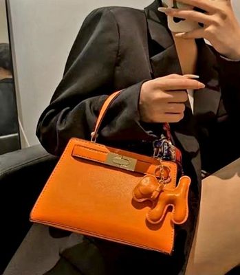 Orange top-handle bag
