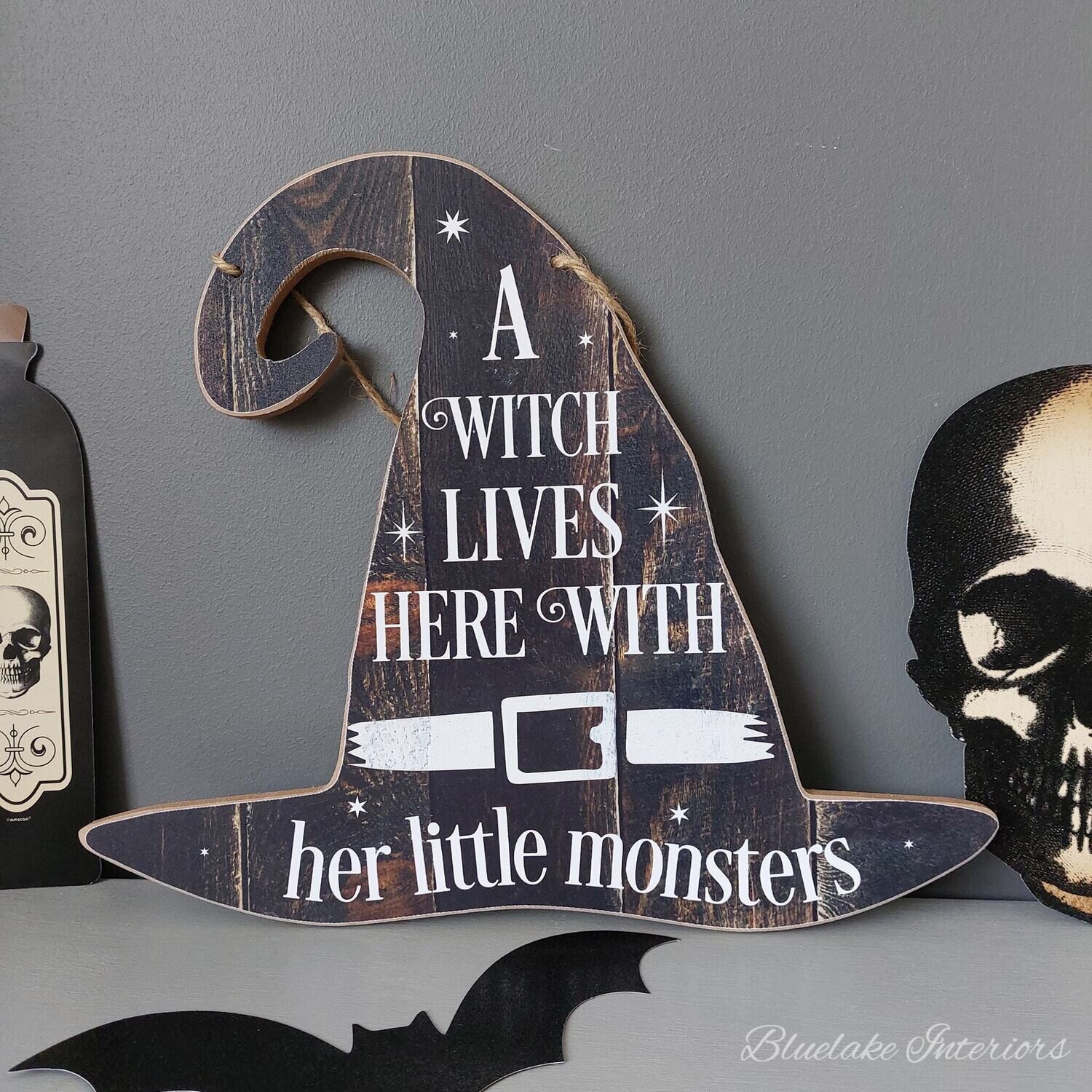 A Witch Lives Here With Her Little Monsters Halloween Wall Plaque