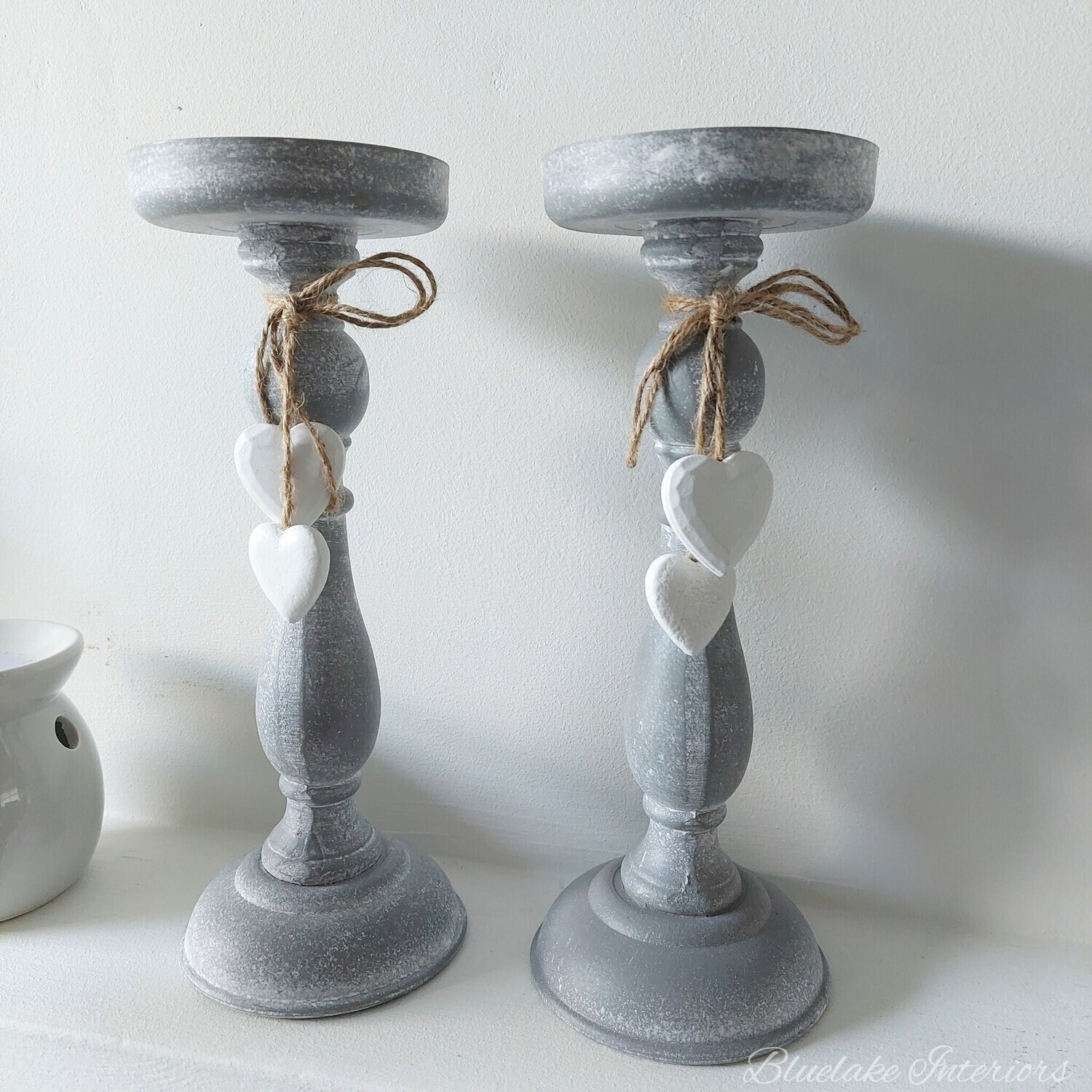 Pair Of Grey Distressed Wooden Candlesticks With White Hearts