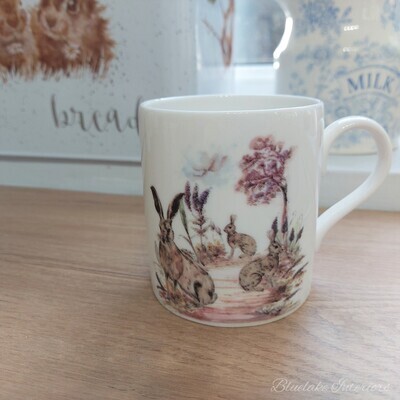 Whimsical Hares Coffee Mug by Claire Louise
