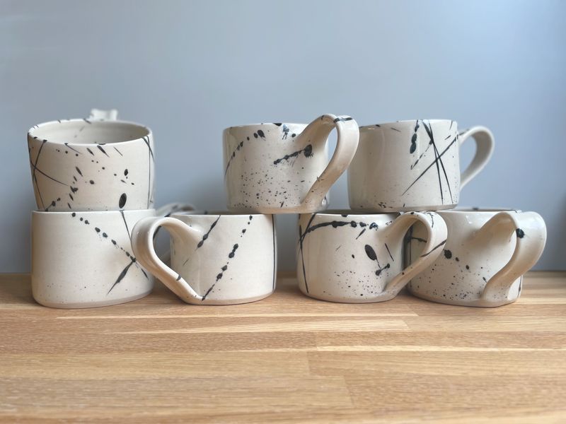 Black Splatter Mugs