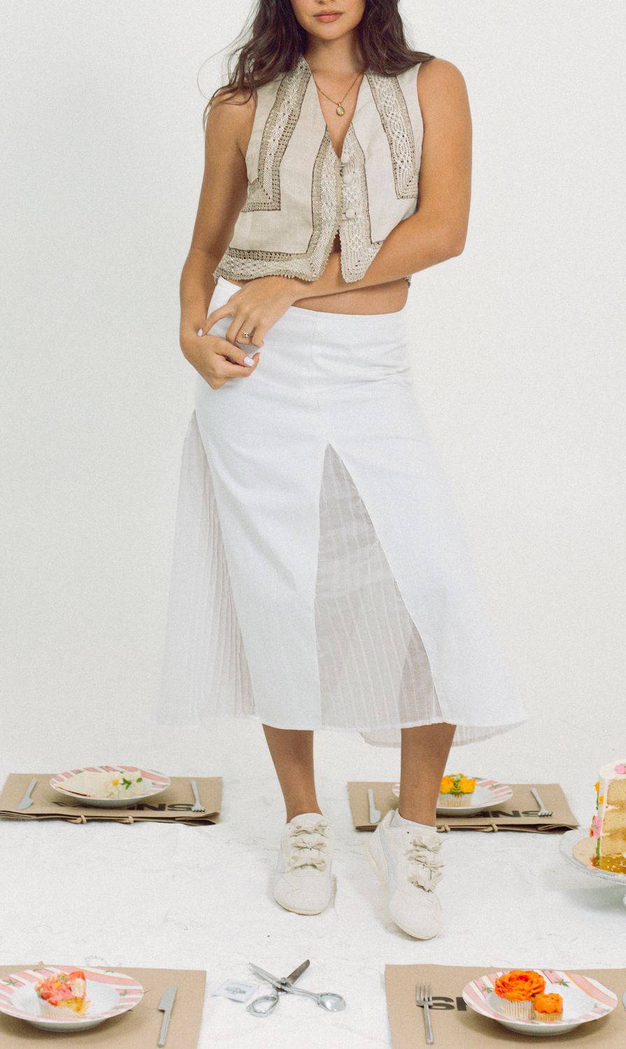 The White Pleated Skirt