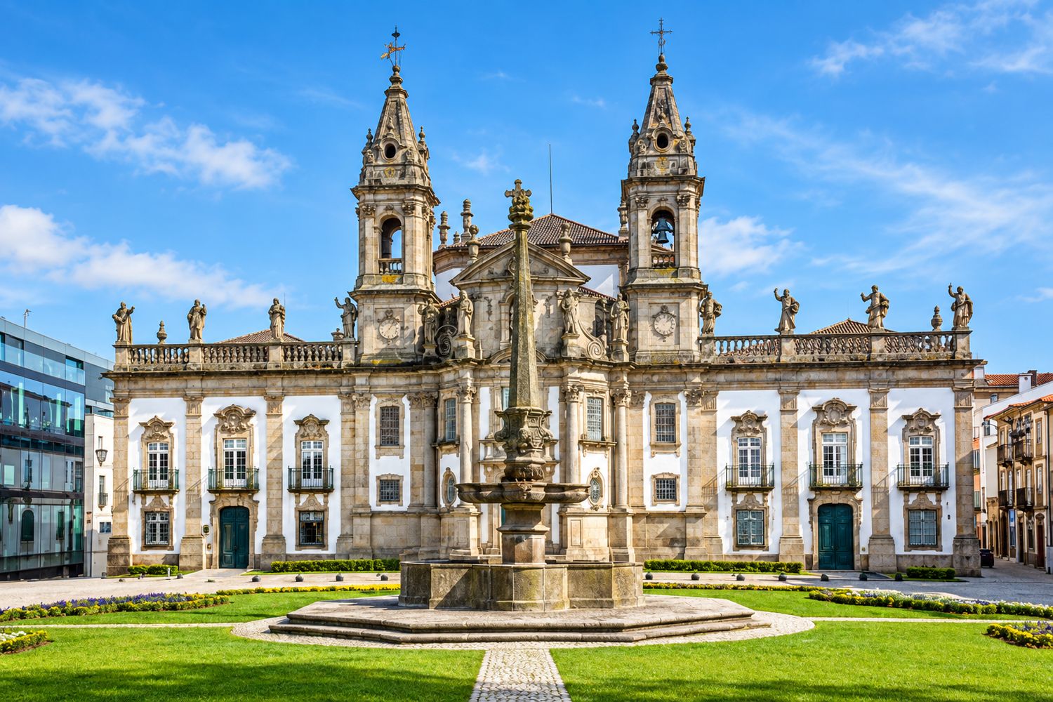 Historic church facade and fountain in Braga, a stop on the private Minho tour; digitally enhanced image.