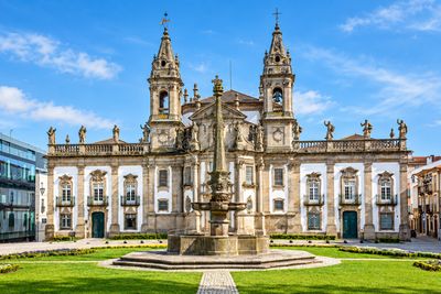Braga, Guimarães, Viana do Castelo & Valença Private Tour Historic church facade and fountain in Braga, a stop on the private Minho tour; digitally enhanced image.