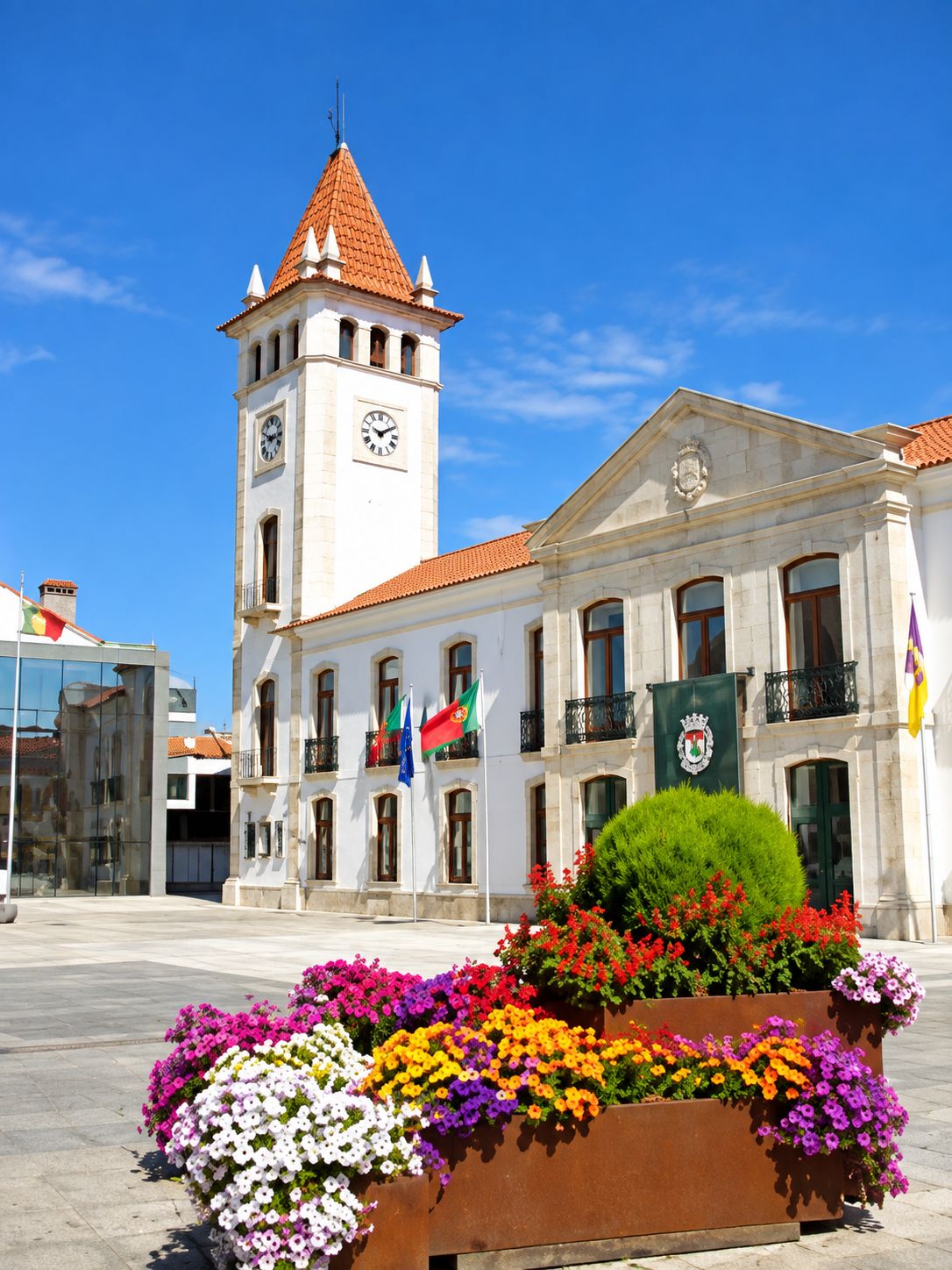 Cantanhede ↔ Porto Airport Private Transfer Cantanhede town hall, clock tower and flowers; digitally enhanced image.