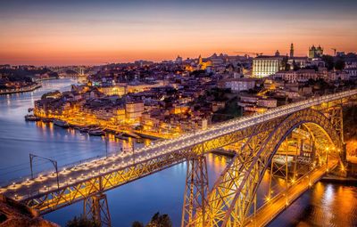 Dom Luís I Bridge, the Douro River and Porto at sunset, viewed from Vila Nova de Gaia.