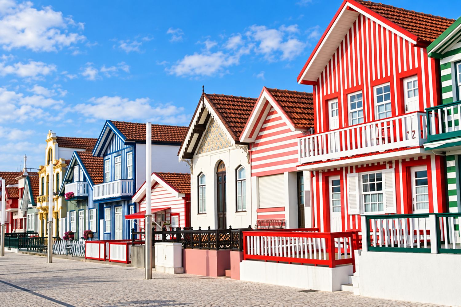 Colourful striped houses in Costa Nova; digitally enhanced image.