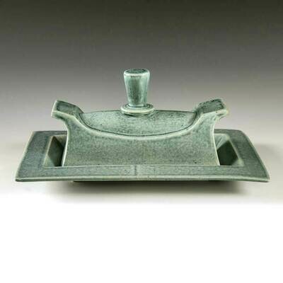 Butter Dish - Turquoise glaze with cascading detailing. Features a handsome Tapered Handle. Butter Dish - Turquoise glaze with cascading detailing. Features a handsome Tapered Handle.