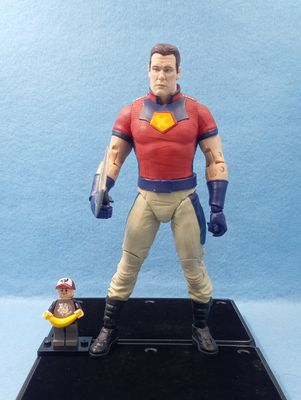 MCFARLANE DC MULTIVERSE PEACEMAKER (UNMASKED) (P/O)