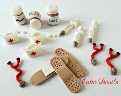 Nurse Fondant Handmade Edible Cupcake Toppers of band aids, syringe, stethoscope, nurse's cap, and pill bottles