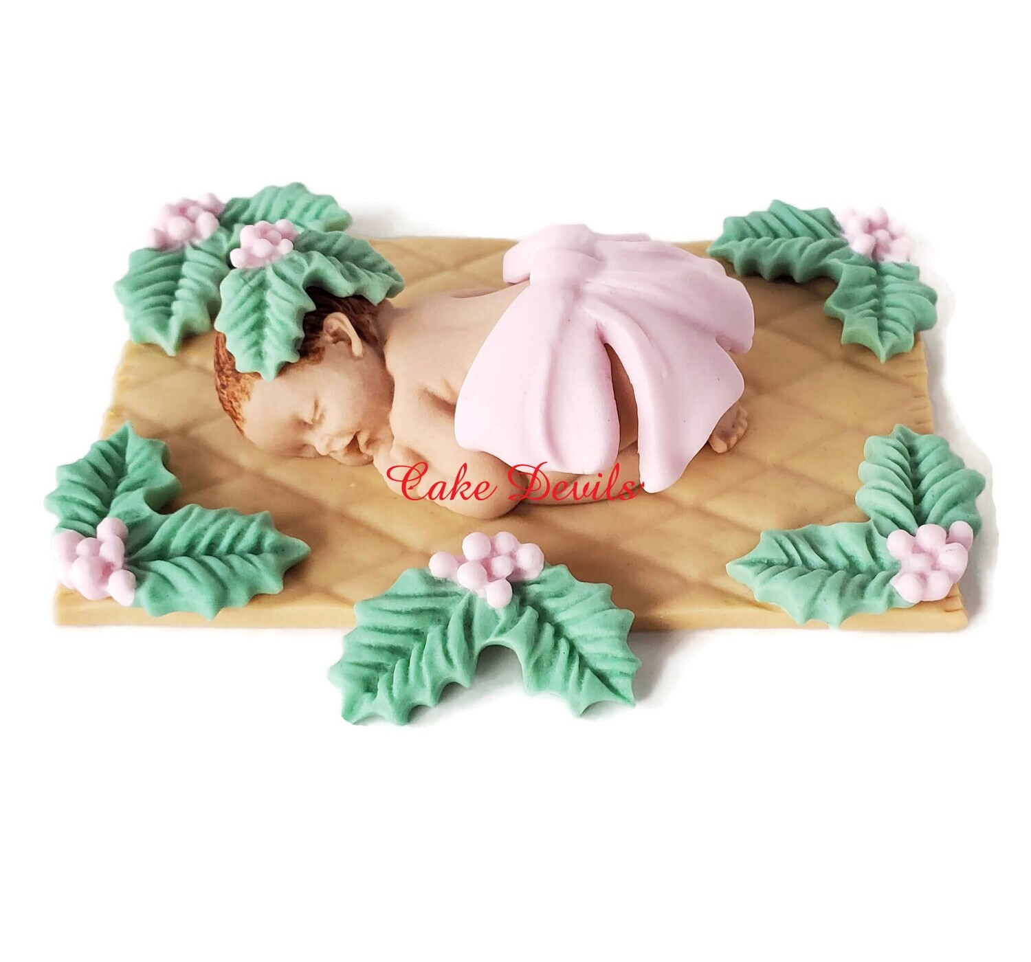 Fondant Baby with Holiday Bow and Holly Berries for a Christmas Baby Shower or Pregnancy Announcement