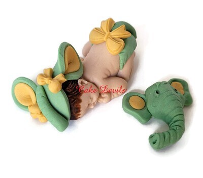 Fondant Baby Sleeping Baby Shower Cake Topper dressed as an Elephant with an toy elephant head pillow