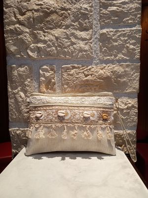 Pochette pompons écru 