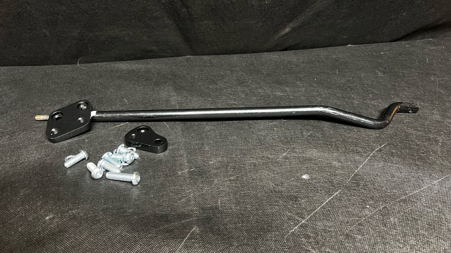 Dyna rear brake bar