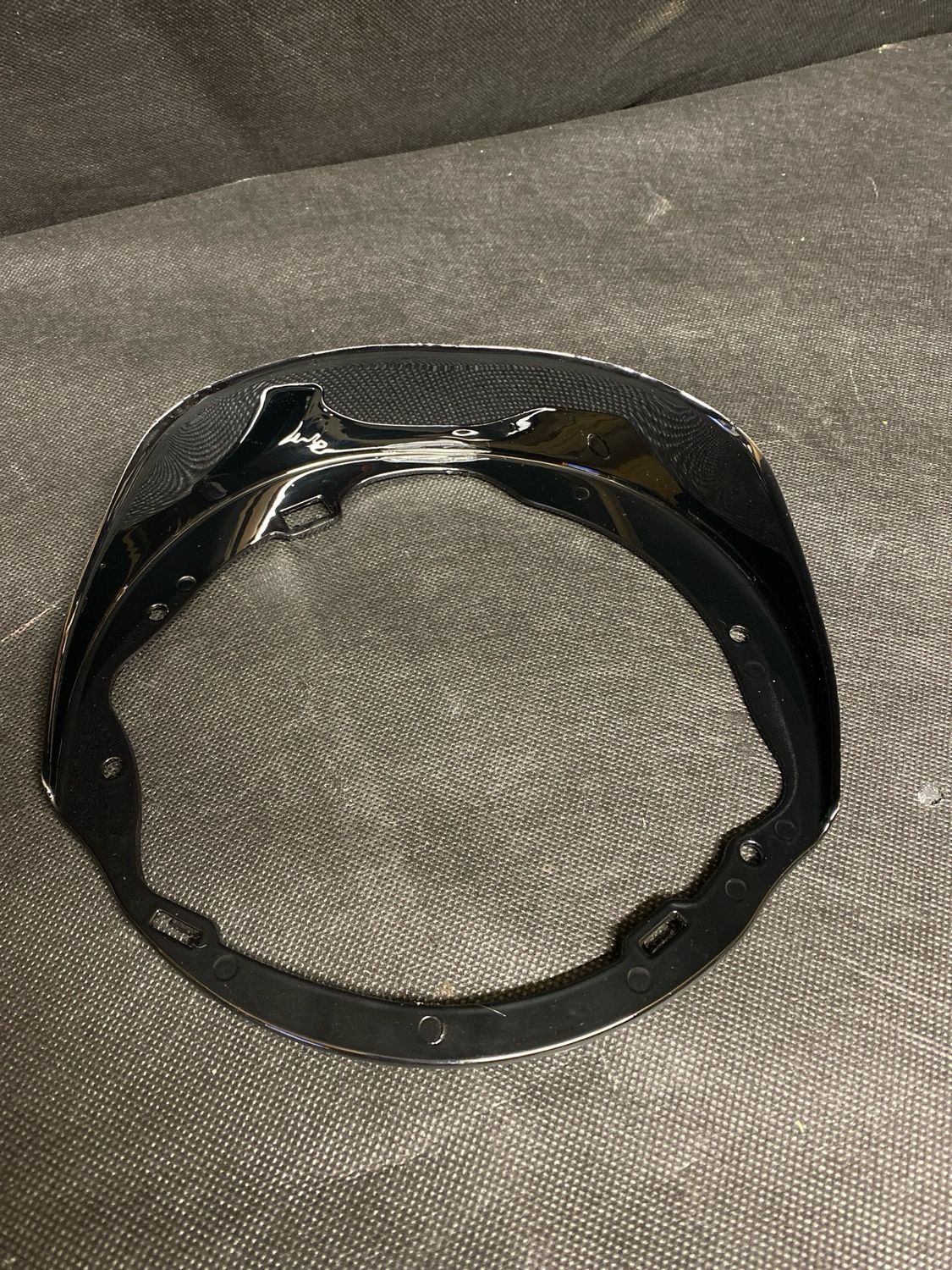 Touring front feiring headlight bracket