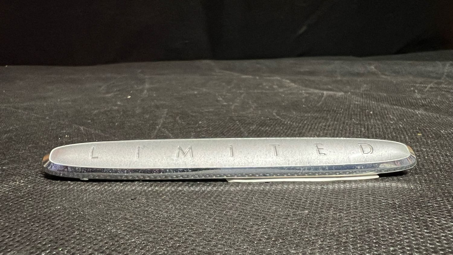 #OEM 59249-10 Limited Ultra Fender Name Plate (used)