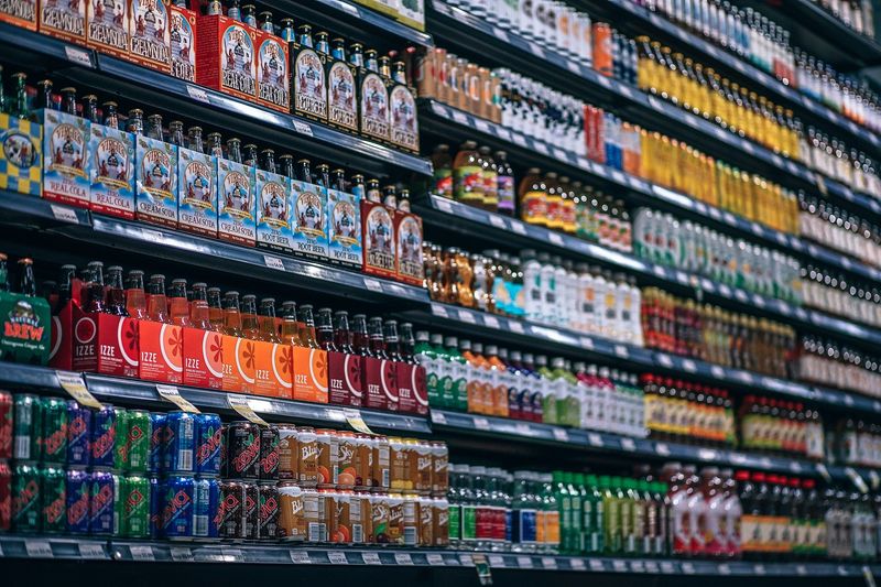 Beverages placed on shelves inside a store
