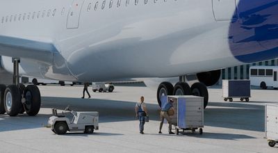 Some Ground Support Equipment next to an airplane