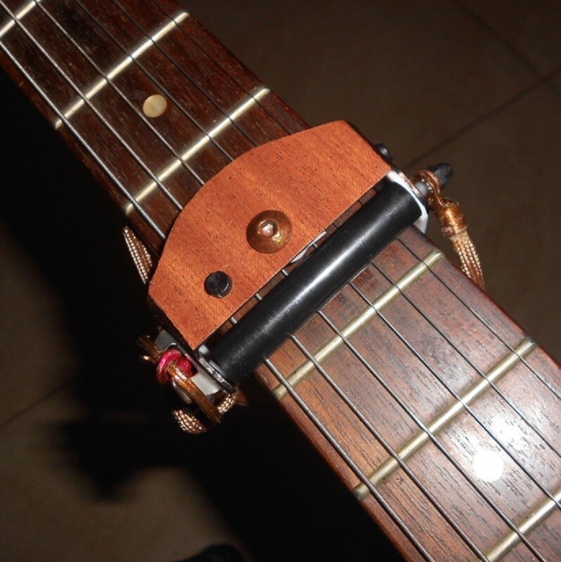 ROLLING CAPO. Brown real wood veneer finish