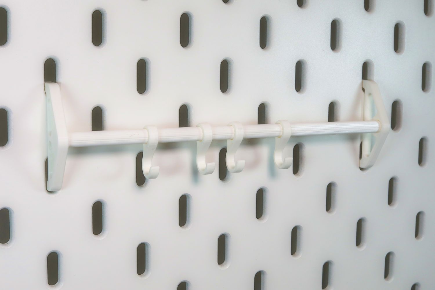 Small wall bar (Incl. 4 hooks) for skadis for one slot for Ikea pegboards Small wall bar (Incl. 4 hooks) for skadis for one slot for Ikea pegboards