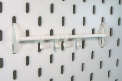 Small wall bar (Incl. 4 hooks) for skadis for one slot for Ikea pegboards Small wall bar (Incl. 4 hooks) for skadis for one slot for Ikea pegboards
