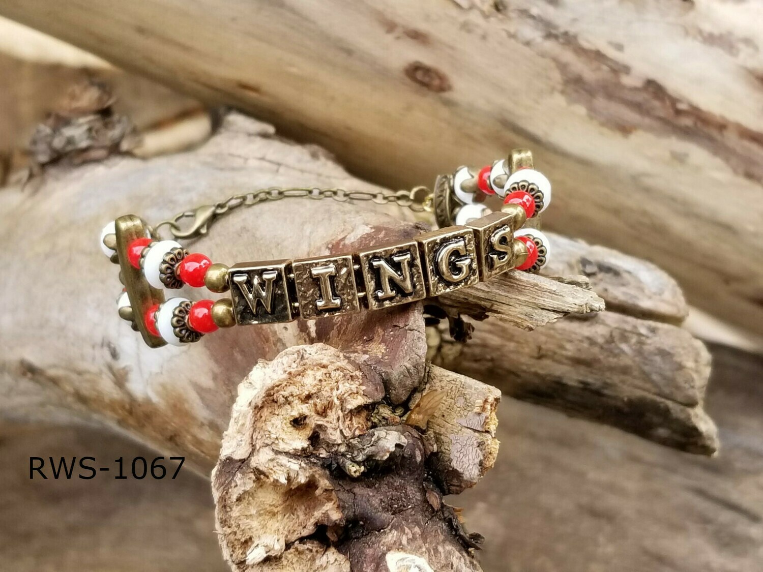 RWS-1067
Detroit Red Wings- Bronze chain bangle &quot;WINGS&quot; alphabet beads, red and white glass beads with bronze colored scacer bars