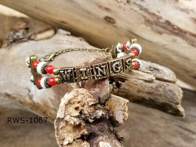 RWS-1067
Detroit Red Wings- Bronze chain bangle &quot;WINGS&quot; alphabet beads, red and white glass beads with bronze colored scacer bars