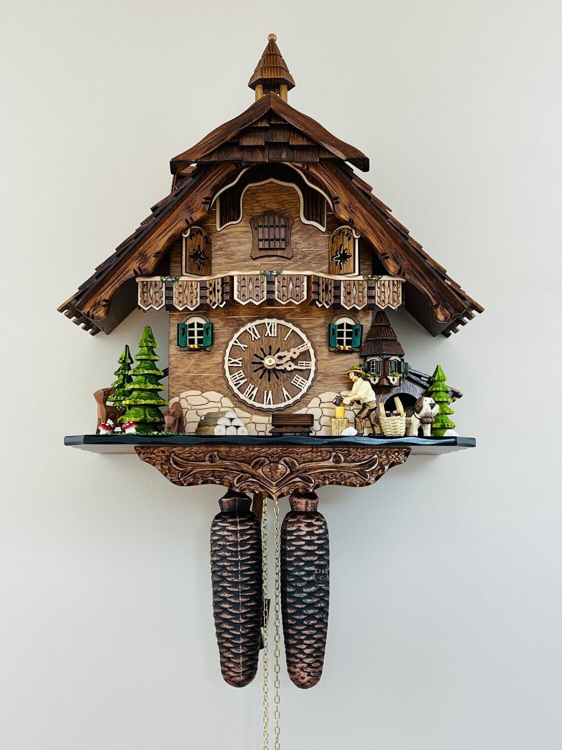 13" Eight Day Cuckoo Clock  - Cottage, Turret, Man Chopping Wood