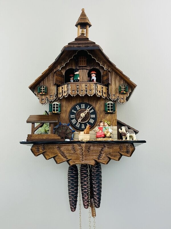 14" One Day Musical Cuckoo Clock Cottage - Boy and Girl Kiss, Waterwheel Turns