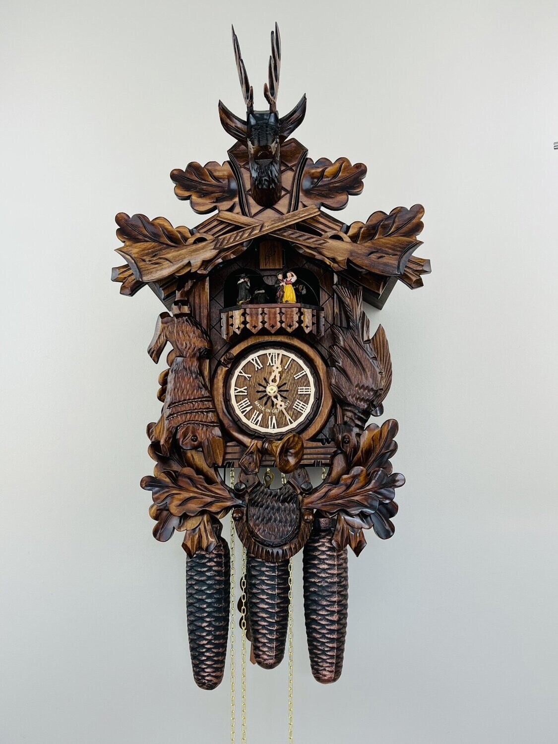 21" Eight Day Musical Hunter's Cuckoo Clock with Dancers - Hand-carved Dead  Animals, Leaves, and Buck