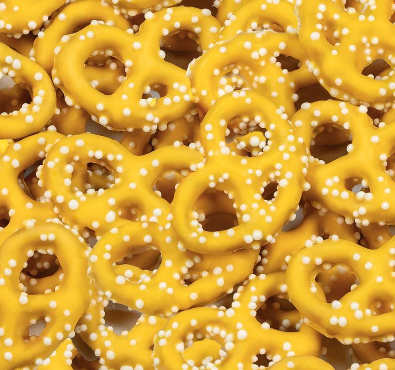 Creamsicle Frosted Pretzels with Nonpareils